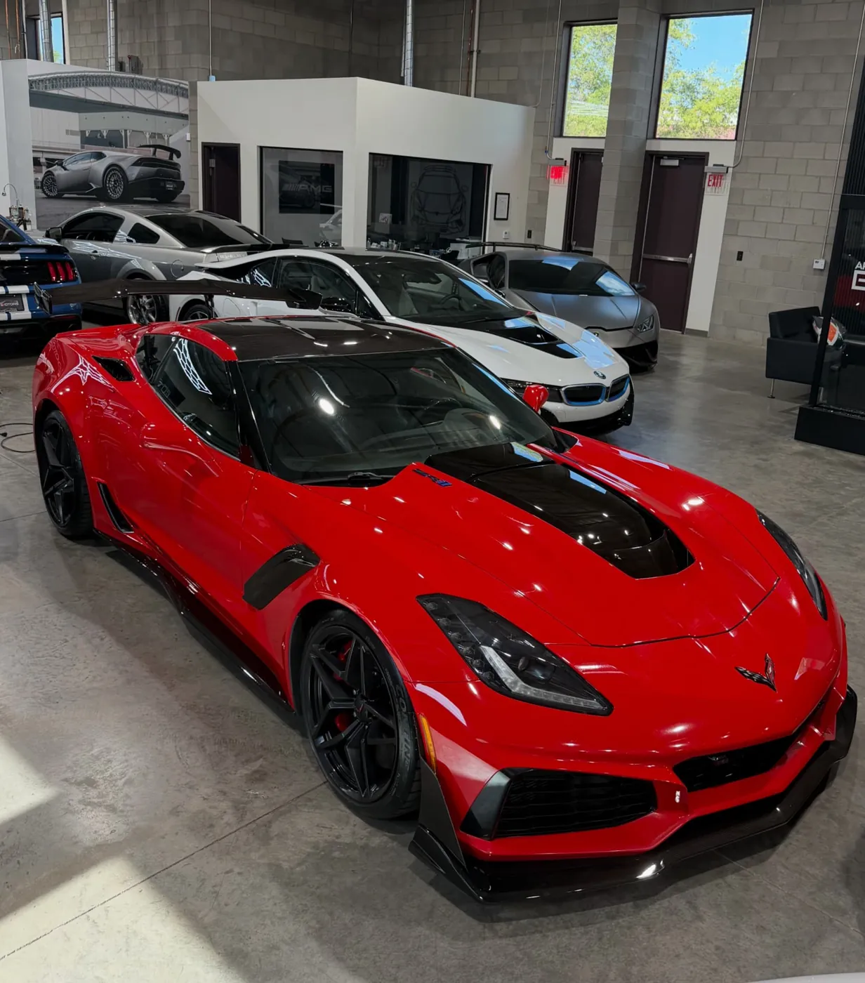 Red Chevrolet Corvette ZR1 with a mirror-gloss finish after a full mobile detail in Phoenix, Arizona